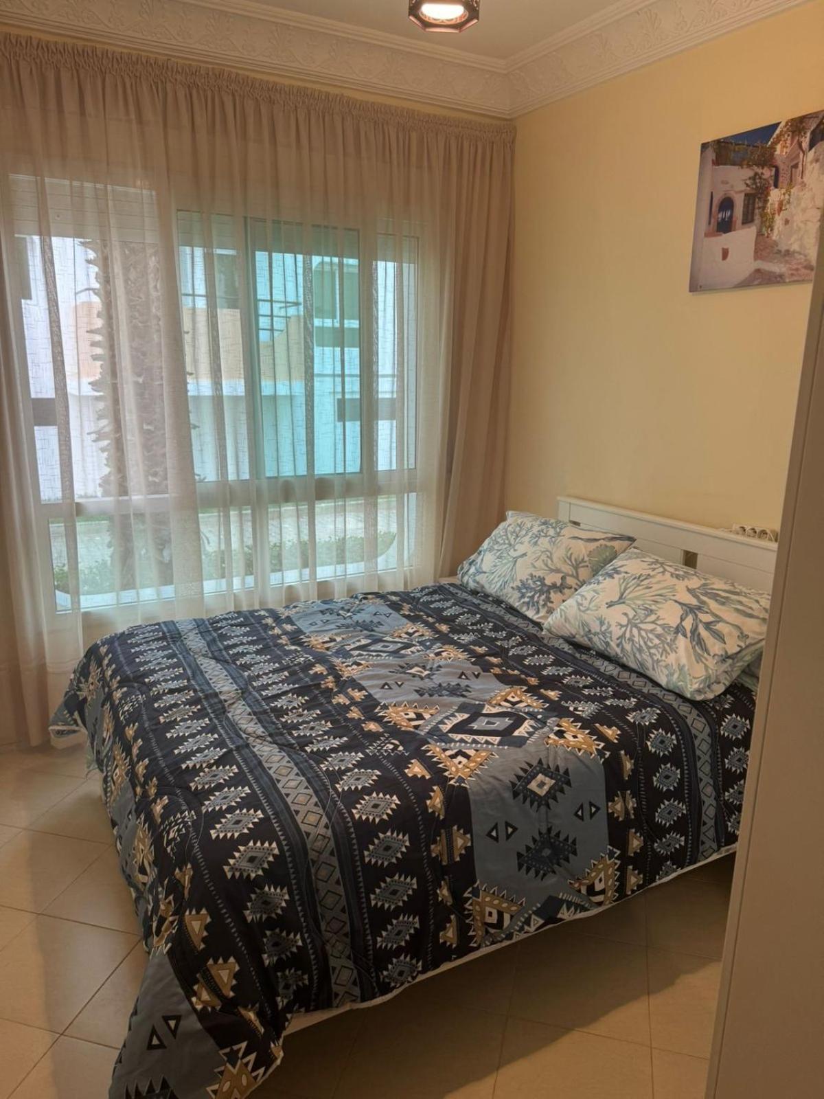 Joli Appartement Balneaire Avec Piscine Tanger Exterior foto